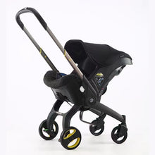 Lade das Bild in den Galerie-Viewer, Doona umbaubarer Kinderwagen-Autositz 
